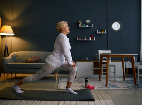 Retired woman enjoy home fitness in living-room Exercise After 6PM Ruins Sleep